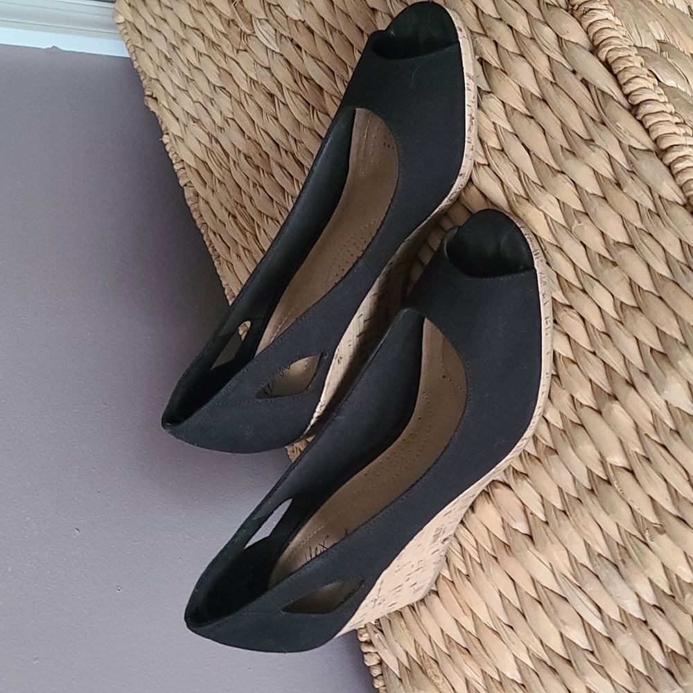 Wedge heel with peep through and peep toe